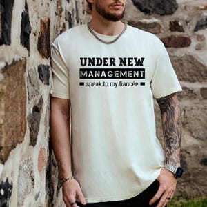 Funny Groom Shirt – Under New Management Tee – Engagement Gift for Fiance – Husband To Be Shirt – Wedding Humor Tee - BRIDE11