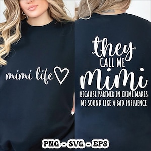 May include: A dark blue t-shirt with white lettering. The front reads "mimi life" with a heart. The back says "they call me mimi because partner in crime makes me sound like a bad influence."