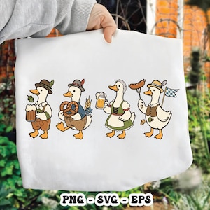 May include: White tote bag featuring a cartoon illustration of four ducks dressed in traditional Bavarian attire. Each duck is holding a beer stein, pretzel, sausage, and a flag. The text "PNG - SVG - EPS" is at the bottom.