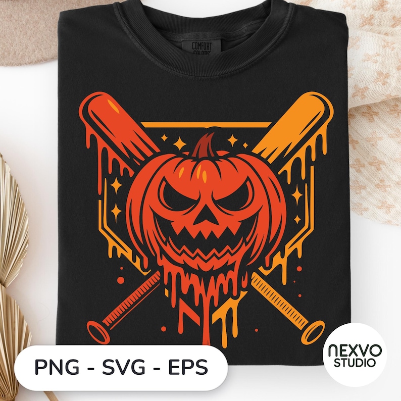 May include: A black t-shirt featuring a graphic of a melting orange jack-o'-lantern centered over two crossed baseball bats. The design includes small star accents and dripping orange paint effects. The shirt has a crew neckline and short sleeves.
