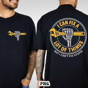 May include: Black t-shirt with a yellow wrench held by a skeletal hand. The back of the shirt has a circular design with the text "I CAN FIX A LOT OF THINGS BUT I CAN'T FIX STUPID."
