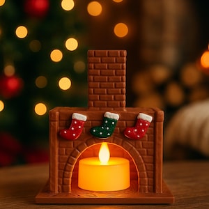 May include: A brown brick-style Christmas candle holder with three miniature stockings. The candle holder has a chimney and an arched opening for the candle. The candle is lit, emitting a warm glow. Christmas decor.