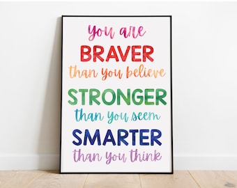 May include: A motivational poster with a rainbow gradient background. The text reads "You are BRAVER than you believe STRONGER than you seem SMARTER than you think."