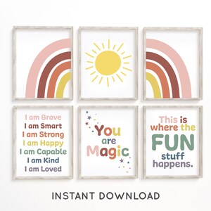 May include: Set of six printable wall art prints featuring rainbow and sun illustrations with positive affirmations. The prints include the text "I am Brave, I am Smart, I am Strong, I am Happy, I am Capable, I am Kind, I am Loved", "You are Magic", and "This is where the FUN stuff happens."
