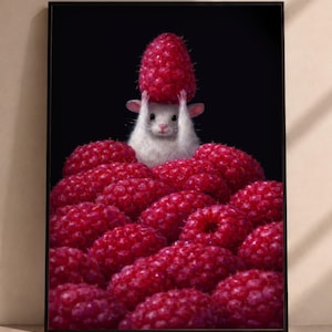 May include: A framed wall art print featuring a small white mouse emerging from a large pile of bright red raspberries. The mouse is holding a single raspberry above its head with both front paws against a solid black background.
