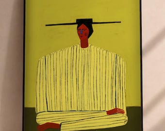 May include: A framed wall art print featuring a stylized illustration of a figure wearing a wide-brimmed black hat and a yellow striped long-sleeved garment. The figure has dark skin, a blue nose, and is seated against a solid olive green background.