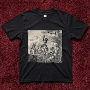 May include: Black t-shirt featuring a detailed black and white illustration. The graphic depicts a historical scene with figures, clouds, and a person suspended in the air, creating a dramatic visual.