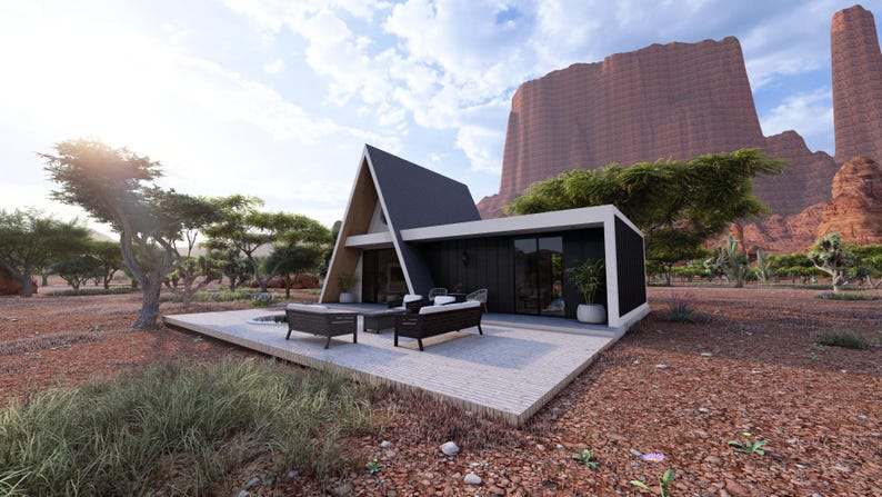 K&ouml;nnte beinhalten: Modernes A-Frame-Haus mit flachem Dach, eingebettet in eine W&uuml;stenlandschaft mit roten Felsformationen. Es verf&uuml;gt &uuml;ber eine Terrasse mit Gartenm&ouml;beln, Topfpflanzen und gro&szlig;en Fenstern.
