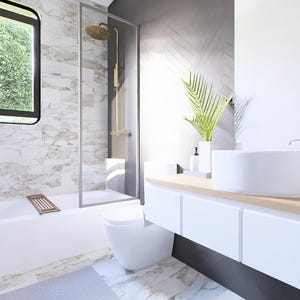 May include: Contemporary bathroom interior with a white suite, including a bathtub, toilet, and basin. The shower has a glass screen and gold fittings. A window provides a view of foliage. The vanity unit has white cupboards and a wooden surface.