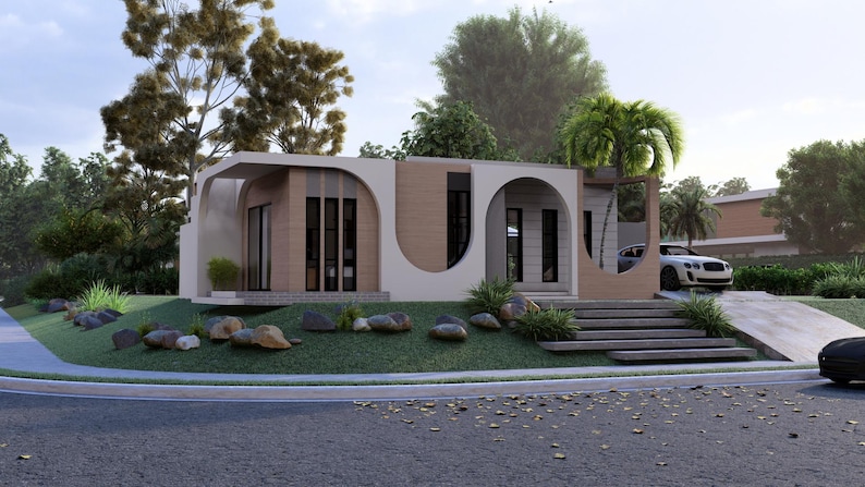 May include: A single-story house featuring a facade with beige and light brown panels, accented by large white arched architectural elements. The structure includes vertical windows, a set of concrete steps, and a driveway with a white car parked.
