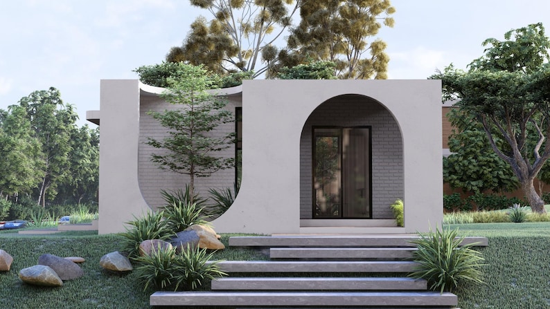 May include: Architectural rendering of a modern, minimalist house with a light-colored exterior. The design features a curved archway, large windows, and a series of steps leading to the entrance. Landscaping includes greenery and large rocks.