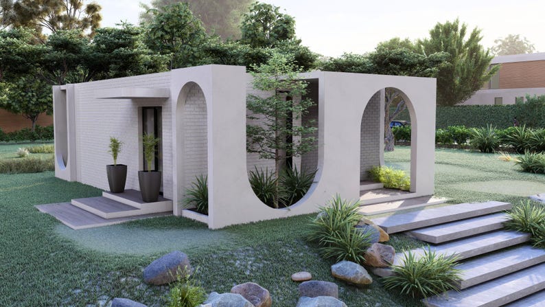 May include: Architectural rendering of a modern, minimalist home with a white exterior and arched openings. The structure features a flat roof, brick accents, and is surrounded by lush greenery, including trees, shrubs, and a well-manicured lawn. The design incorporates steps and stone pathways.