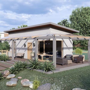 May include: A small, modern, grey house with a covered patio and wooden deck. The house has large windows and a wooden door. The patio is furnished with chairs and a table. The house is surrounded by green grass and trees.