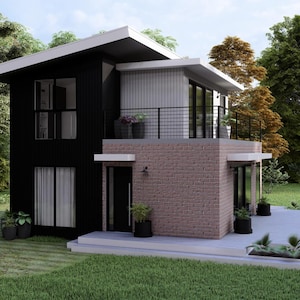 Op de afbeelding: Een modern huis met twee verdiepingen, een zwart exterieur en een wit dak. Het huis heeft grote ramen, een balkon met een zwarte balustrade en een bakstenen gevel. De landschapsarchitectuur omvat potplanten en een groen gazon.