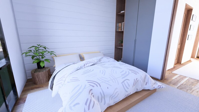 Puede incluir: Un dormitorio con una cama, una planta y un armario. La cama tiene un edred&oacute;n y almohadas con estampado blanco y gris. Una planta verde se encuentra sobre un toc&oacute;n de madera. Un armario gris est&aacute; a la derecha.