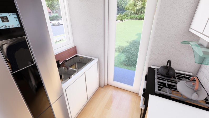 May include: Interior shot of a modern kitchen with a stainless steel sink, white cabinets, and a gas stove. A black kettle and a gray teapot sit on the stove. A window and a door provide natural light.