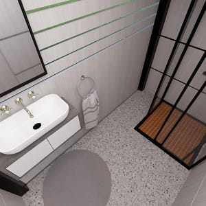 Op de afbeelding: Een modern badkamerontwerp met een witte ovale wastafel met chromen armaturen, een grote spiegel en een glazen douchecabine met een houten vloer. De vloer is gespikkeld met grijs en wit. Een handdoek hangt aan een chromen ring.