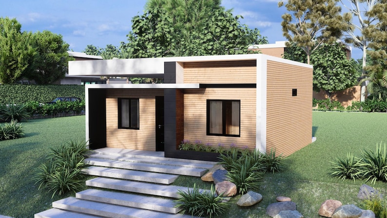 Puede incluir: Una casa moderna de una sola planta con techo plano y revestimiento marr&oacute;n claro. La casa cuenta con ventanas con marcos negros, una escalera de hormig&oacute;n y est&aacute; rodeada de c&eacute;sped verde y paisajismo.