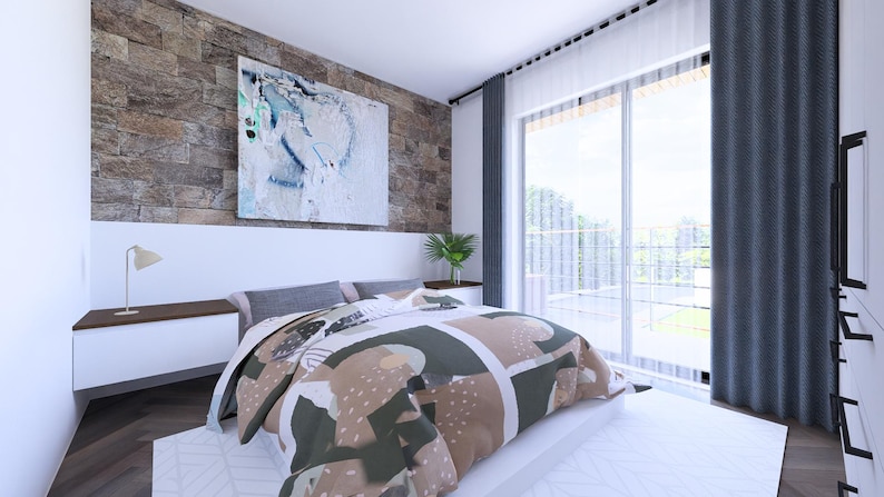 May include: A modern bedroom with a large bed featuring a patterned comforter in shades of brown, green, and white. The room has a stone accent wall, a large window with gray curtains, and a piece of abstract art above the bed.