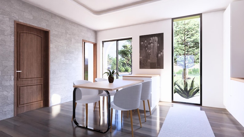 May include: A dining room with a light wood table and four white chairs. A large window offers a view of a tree and greenery. The room has a wooden door and a gray stone wall.