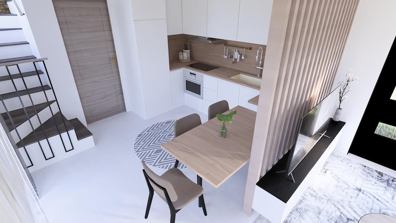 May include: An overhead view of a modern kitchen and dining area. The kitchen features white cabinets, a wooden countertop, and stainless steel appliances. A wooden table with four chairs sits in the dining area, with a decorative rug and a staircase in the background.