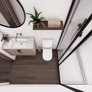 May include: An overhead view of a modern bathroom with a wooden floor and white walls. The bathroom features a sink, toilet, and a shower with a black frame. A mirror and a shelf with plants and a box are also visible.