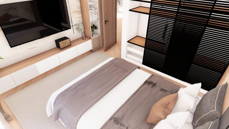 May include: A bedroom interior featuring a bed with a white duvet, a taupe textured throw blanket, and assorted pillows in taupe, white, and gray. A wall-mounted television sits above a white and light wood media console, next to a black slatted wardrobe.