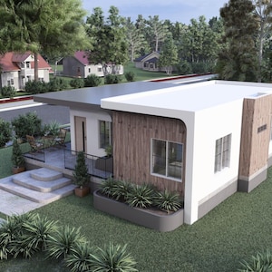 May include: A modern, single-story house with a flat roof and a combination of white and wood-paneled exterior. The house has a small porch with a black railing and a concrete walkway leading to the entrance. The house is surrounded by green grass and trees.