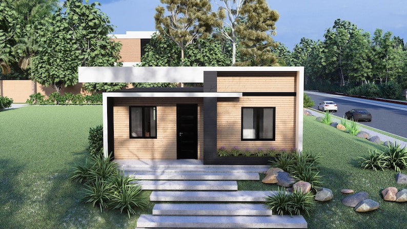 Puede incluir: Una casa moderna de una sola planta con exterior de madera clara y techo plano. La casa tiene una puerta principal y ventanas negras, con un peque&ntilde;o jard&iacute;n al frente. Una entrada para autos y coches son visibles en el fondo.