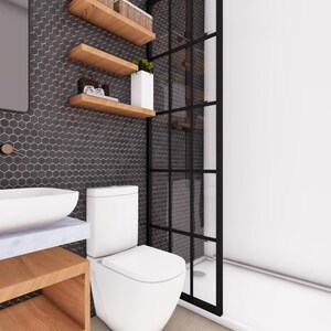 Puede incluir: Dise&ntilde;o de ba&ntilde;o moderno con un lavabo ovalado blanco sobre una encimera de m&aacute;rmol, un inodoro blanco y estantes de madera. Las paredes est&aacute;n decoradas con azulejos hexagonales de color gris oscuro. Se ve una puerta de ducha con marco negro.