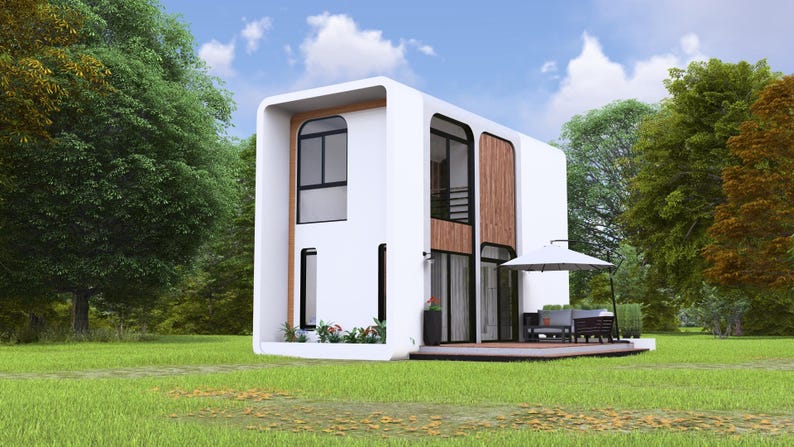 May include: Contemporary two-storey white house with large windows and wooden panels. Includes a small patio with outdoor furniture and a parasol. Set in a green garden with trees and a blue sky.