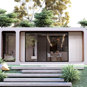 Peut inclure: Petite maison moderne et minimaliste avec un ext&eacute;rieur de couleur claire, de grandes fen&ecirc;tres et un toit plat. La maison est entour&eacute;e d'une verdure luxuriante, avec des arbres, des buissons et de l'herbe, et est accessible par des marches en b&eacute;ton.