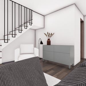 Puede incluir: Un sal&oacute;n moderno con un armario gris, un sill&oacute;n blanco y una alfombra de patrones grises y blancos. La habitaci&oacute;n cuenta con una escalera con una barandilla de metal negro.