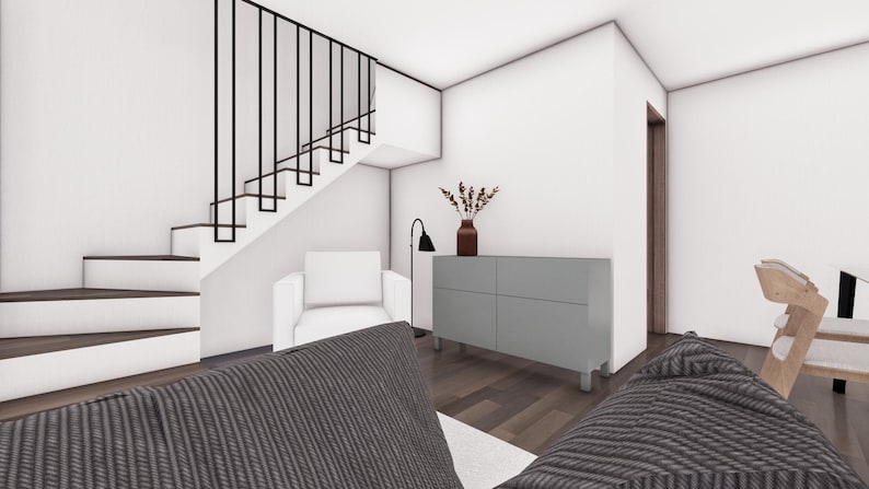 Puede incluir: Un sal&oacute;n moderno con un armario gris, un sill&oacute;n blanco y una alfombra de patrones grises y blancos. La habitaci&oacute;n cuenta con una escalera con una barandilla de metal negro.