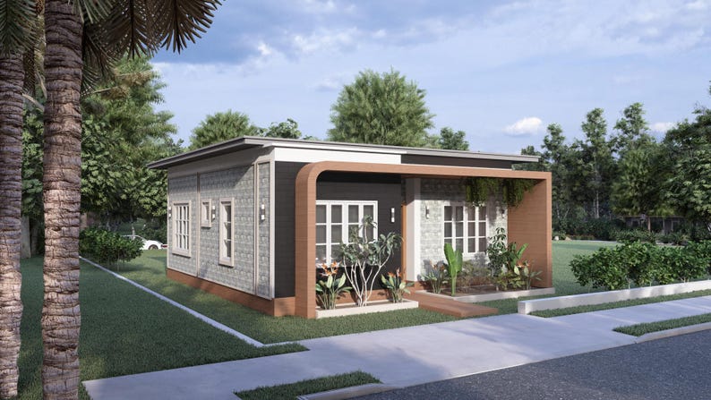 Peut inclure: Une maison moderne de plain-pied avec un toit plat, pr&eacute;sentant une fa&ccedil;ade grise avec des encadrements de fen&ecirc;tres blancs et un accent marron fonc&eacute;. La maison est entour&eacute;e d'herbe verte, d'arbres et d'une all&eacute;e pav&eacute;e. La conception int&egrave;gre un cadre en bois.