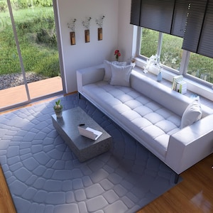 May include: A contemporary living room featuring a white sofa, a grey coffee table, and a patterned rug. Large windows provide a view of the garden. The room is decorated with plants and books, creating a comfortable atmosphere.