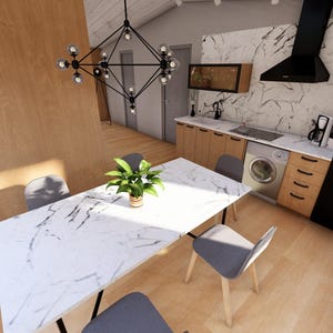 May include: Interior view of a modern kitchen and dining space. It features a white marble dining table with grey chairs, wooden flooring, and a kitchen with wooden cabinets and a marble splashback. A black chandelier hangs above the table.