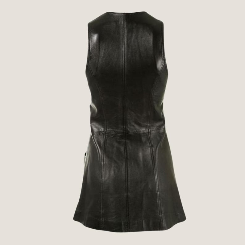 May include: A sleeveless black leather dress with a fitted bodice and a flared skirt.