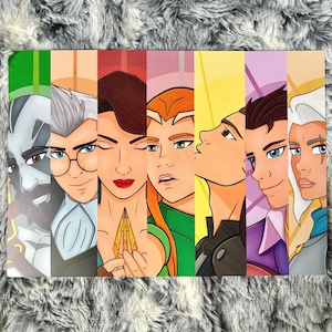 May include: A colorful print featuring stylized portraits of seven characters, each in a vertical panel with a different background color. The characters have distinct facial features and expressions, with varying hair colors and styles. The artwork has a comic book or animated style.