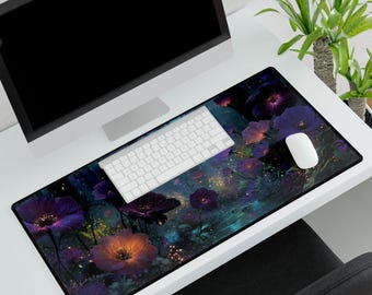 May include: A rectangular desk mat featuring a floral design with purple and orange flowers. A white keyboard and mouse sit on the mat, with a computer monitor in the background. The mat measures approximately 31.5 inches long and 11.8 inches wide.