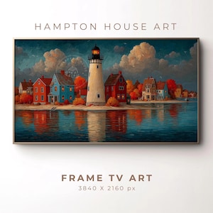 Puede incluir: Pintura de paisaje enmarcada que representa un faro y casas coloridas en la costa. La obra de arte tiene una paleta de colores cálidos con rojos, azules y naranjas. El texto "HAMPTON HOUSE ART" está en la parte superior.