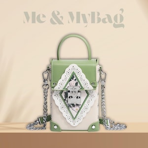 Chic Green Leather Bucket Bag with Floral Cutout Design – Unique Mini Crossbody Purse with Chain Strap, Elegant Statement Shoulder Bag