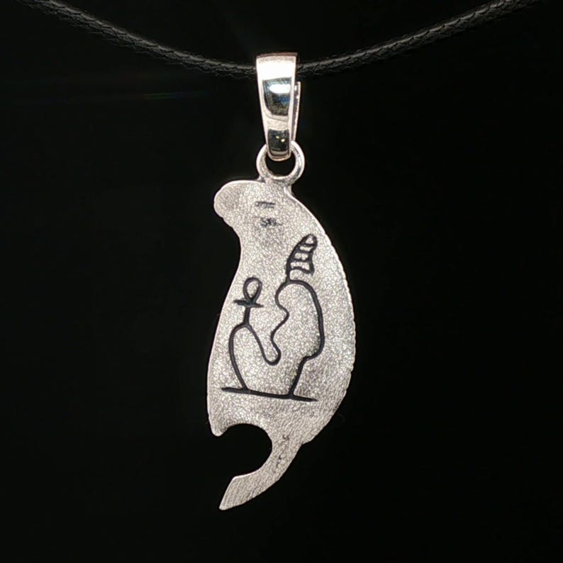 Feather of Ma’at pendant in sterling silver Egyptian goddess amulet. Sterling silver Maat feather pendant symbol of truth and justice.