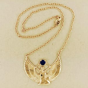 Winged Isis jewelry with lapis lazuli classic Egyptian goddess necklace. Bronze Isis necklace lapis lazuli gemstone Egyptian mythology pendant. Handmade Isis goddess necklace in antique bronze lapis jewelry