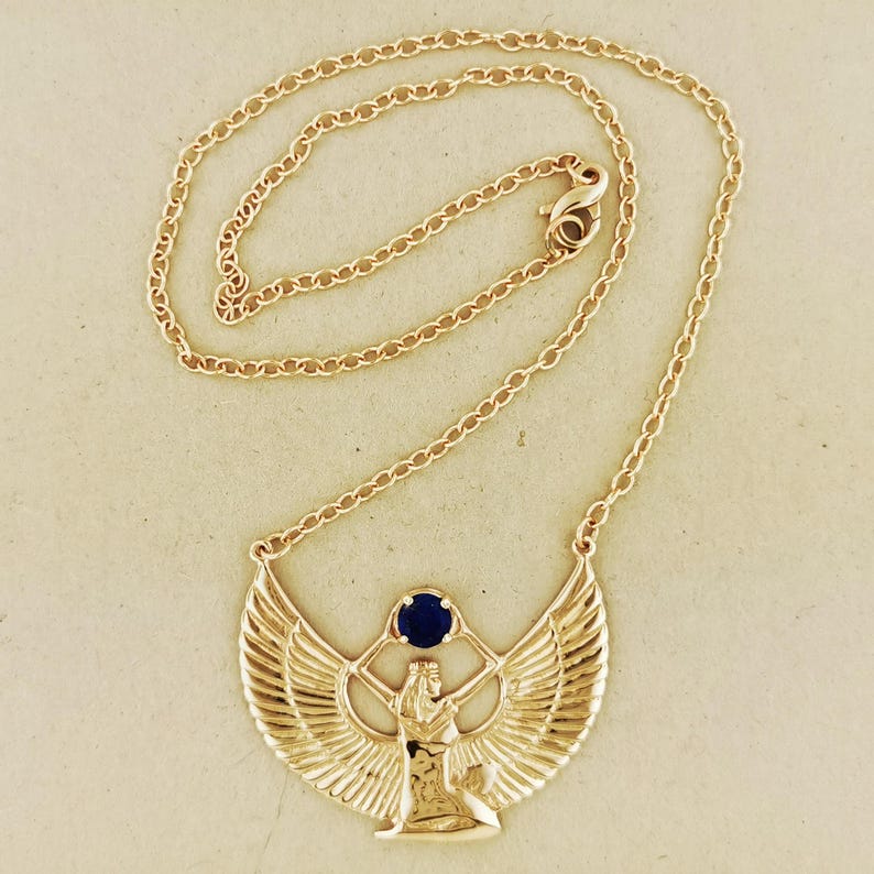 Winged Isis jewelry with lapis lazuli classic Egyptian goddess necklace. Bronze Isis necklace lapis lazuli gemstone Egyptian mythology pendant. Handmade Isis goddess necklace in antique bronze lapis jewelry