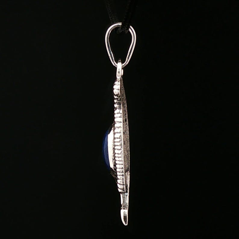 Feather of Ma’at pendant in sterling silver Egyptian goddess amulet. Sterling silver Maat feather pendant symbol of truth and justice.