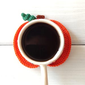 pumpkin crochet coaster, halloween coaster, crochet pattern for beginners, crochet coaster pattern pdf, easy crochet pattern, fall decor crochet, autumn crochet ideas, crochet coaster digital download, mug rug crochet, trivet crochet coaster, crochet doily pattern, crochet fall home decor, pumpkin motif crochet, cozy home gift, crochet pdf pattern, crochet coaster tutorial, beginner crochet project, crochet coaster diy, crochet pumpkin pattern, fall crochet decoration, home decor crochet