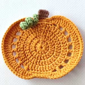 fall crochet coaster, crochet coaster pattern, crochet pumpkin design, crochet coaster pdf, crochet tutorial, crochet pattern instant download, beginner friendly crochet, easy crochet pattern, crochet coaster for beginners, mug rug crochet, trivet crochet pattern, crochet home decor, cozy crochet coaster, crochet fall diy, crochet pumpkin coaster, crochet gift idea, halloween home decor, crochet digital pattern, crochet autumn decor, fall home crochet, pumpkin crochet pdf pattern