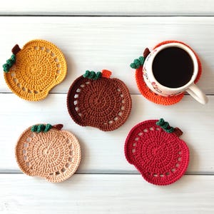 autumn crochet coaster, crochet coaster pattern pdf, pumpkin coaster diy, easy crochet pattern, beginner crochet project, crochet mug rug, crochet trivet, crochet doily, halloween pumpkin coaster, crochet coaster for coffee cup, fall crochet pattern, crochet pdf tutorial, handmade crochet gift, home decor ideas, instant download crochet pattern, cozy fall home, pumpkin crochet design, digital crochet pattern, crochet fall decor, crochet table setting, crochet coaster handmade, fall coaster