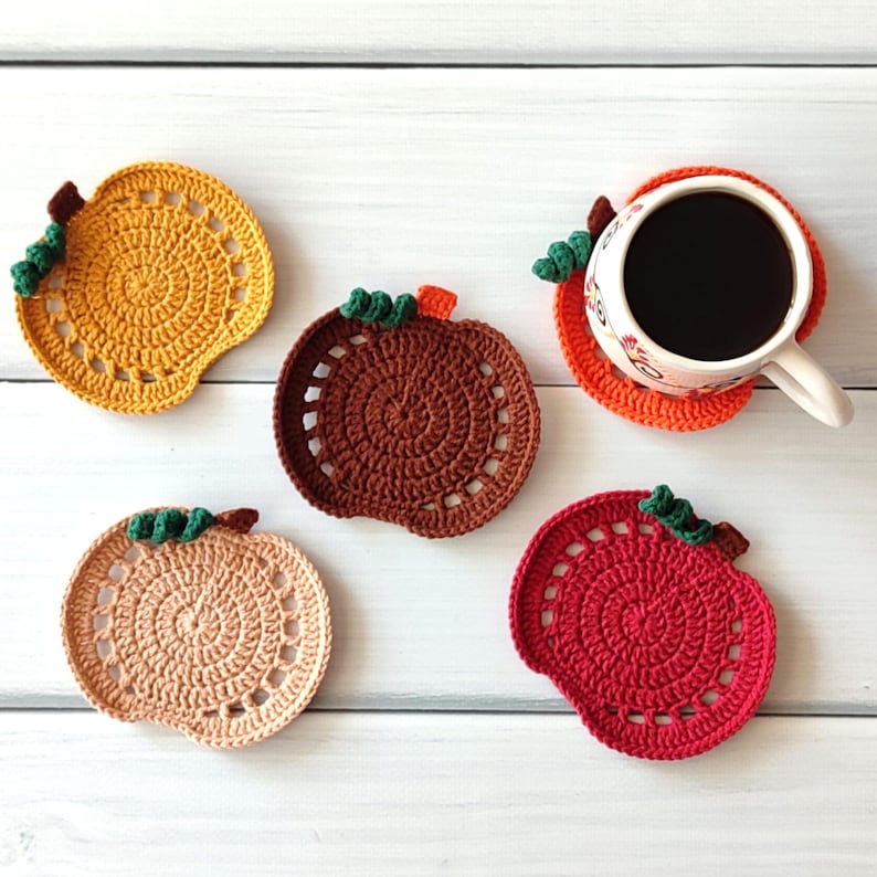 autumn crochet coaster, crochet coaster pattern pdf, pumpkin coaster diy, easy crochet pattern, beginner crochet project, crochet mug rug, crochet trivet, crochet doily, halloween pumpkin coaster, crochet coaster for coffee cup, fall crochet pattern, crochet pdf tutorial, handmade crochet gift, home decor ideas, instant download crochet pattern, cozy fall home, pumpkin crochet design, digital crochet pattern, crochet fall decor, crochet table setting, crochet coaster handmade, fall coaster
